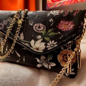 Black floral clutch purse with gold chain and zippers